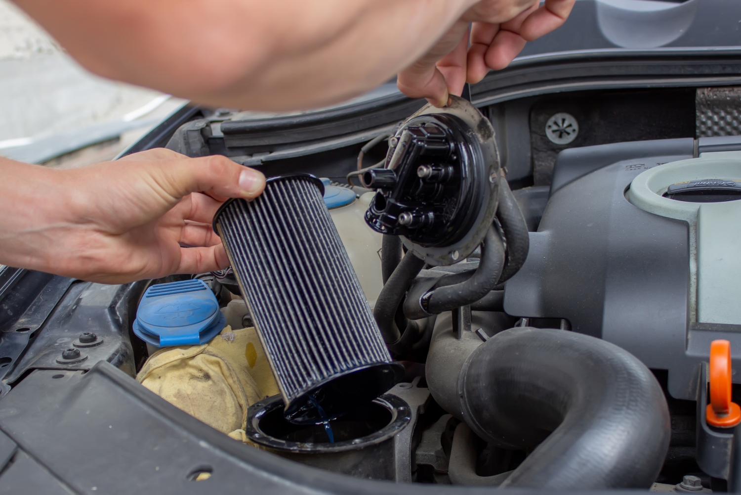 Technician replacing a cabin air filter