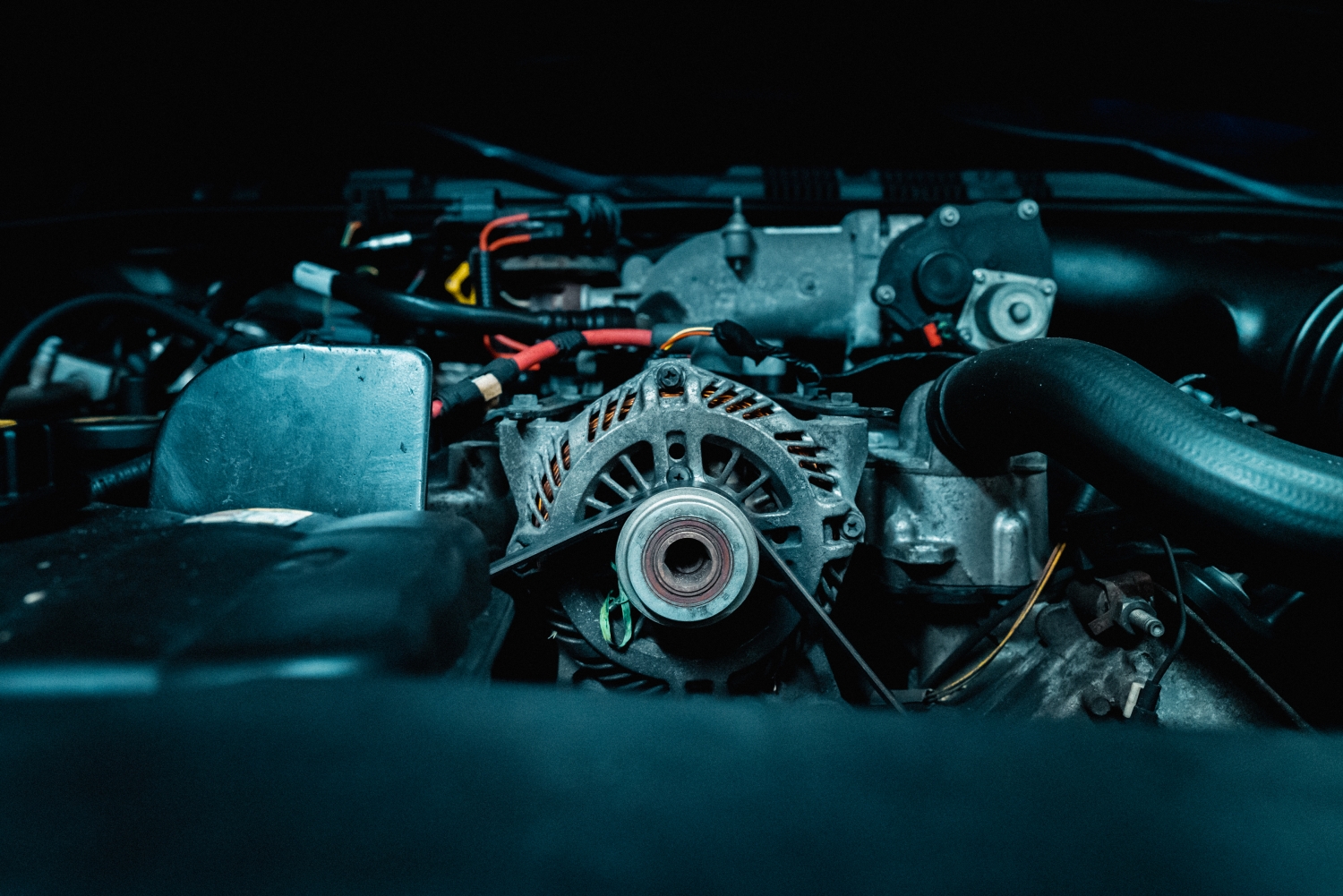 Mechanic repairing an alternator at DriveTime Automotive Salem OR