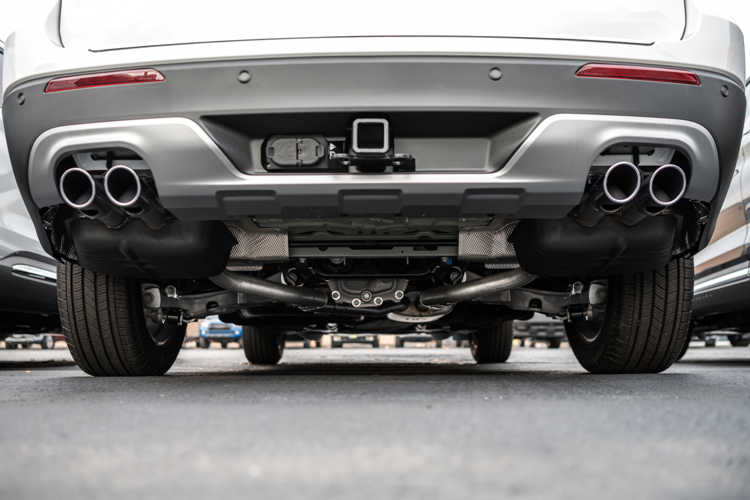 Technician repairing a car's exhaust system at DriveTime Automotive in Salem, OR